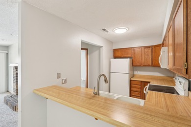 Convenient, low-maintenance living awaits in the heart of