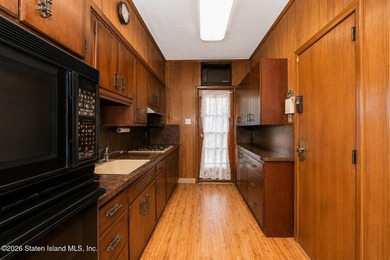 Welcome to this solid brick 5/5 two-family semi-attached home - photo 11