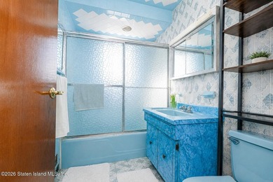 Welcome to this solid brick 5/5 two-family semi-attached home - photo 21