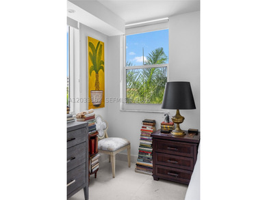 Filled with exceptional natural light from 11 windows and doors - photo 23