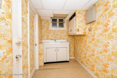 Welcome to this solid brick 5/5 two-family semi-attached home - photo 31