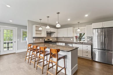 This charming downtown bungalow can't wait to meet you! With - photo 19
