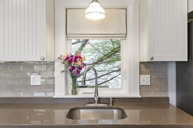 This charming downtown bungalow can't wait to meet you! With - photo 21