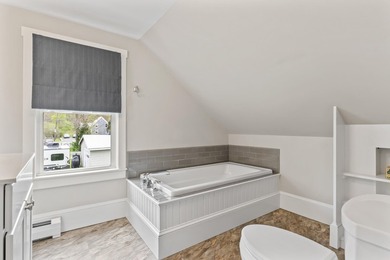 This charming downtown bungalow can't wait to meet you! With - photo 37