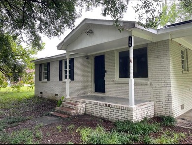 Situated on a half-acre lot with convenient access to Moncks - photo 2