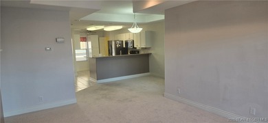 WALK IN UNIT NO STEPS, TWO ELEVATORS IN BUILDING TO GARAGE AND