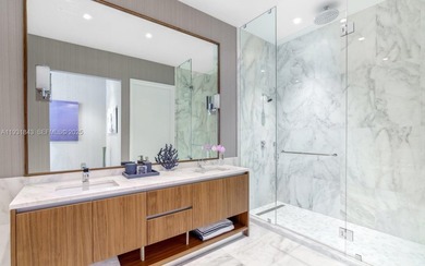 This brand-new 5-bedroom, 6.5-bath bayfront residence at UNA