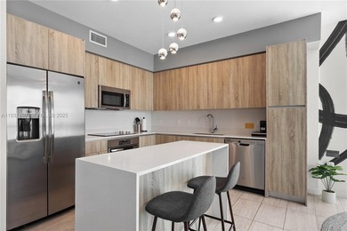 Experience elevated Miami living in this FULLY FURNISHED