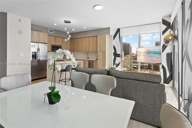 Experience elevated Miami living in this FULLY FURNISHED