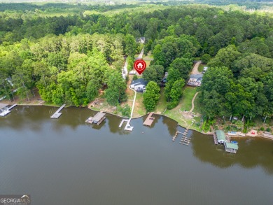 Welcome to your dream lakefront oasis! This stunning 3 bedroom/2 - Lake Home For Sale in Eatonton, Georgia