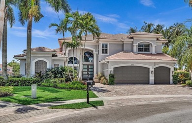 Situated on a beautiful pie-shaped cul-de-sac lakefront lot in - photo 1