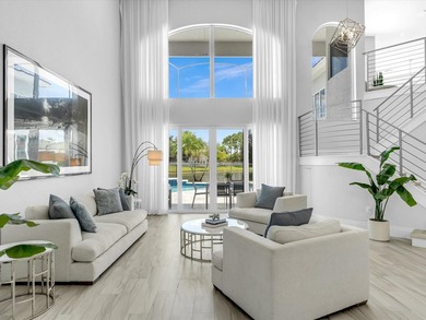 Situated on a beautiful pie-shaped cul-de-sac lakefront lot in - photo 4