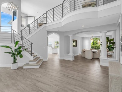 Situated on a beautiful pie-shaped cul-de-sac lakefront lot in - photo 8