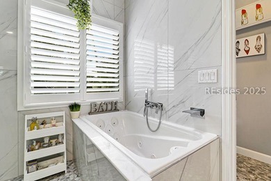 A rare offering... stylishly remodeled, pristinely maintained