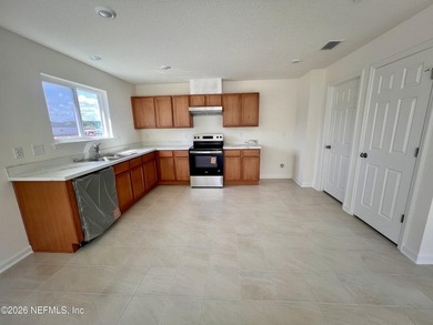 This beautiful single-story home showcases a covered front entry - photo 2