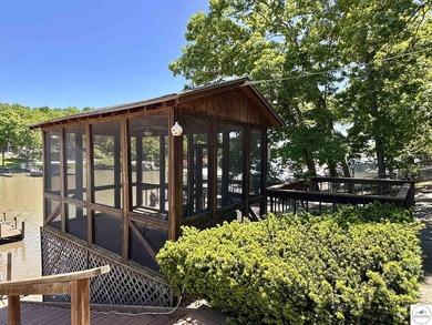 Located on a quiet cove on the Lake of the Ozarks in a very - photo 33