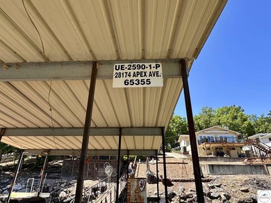 Located on a quiet cove on the Lake of the Ozarks in a very - photo 37