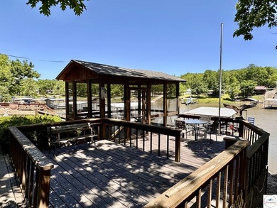 Located on a quiet cove on the Lake of the Ozarks in a very - photo 40