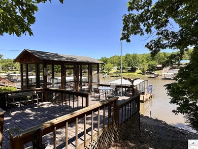 Located on a quiet cove on the Lake of the Ozarks in a very - photo 41