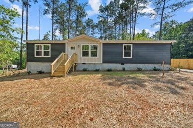 This beautiful home is just what you've been looking for! This - Lake Home For Sale in Eatonton, Georgia