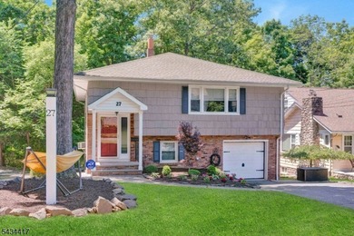 Welcome to Packanack Lake, where lifestyle meets location! This - photo 2