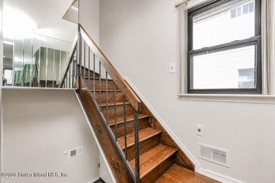 Welcome to this spacious 1-family semi-attached home in the - photo 11