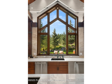 Perched atop Ridge Run on a private 3/4-acre lot, this Michael - photo 24