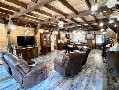 Welcome to this handcrafted barndominium, perfectly set on 34