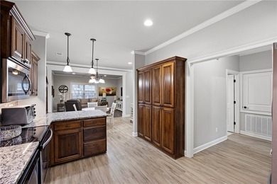 Discover low-maintenance living at its finest in this - photo 3