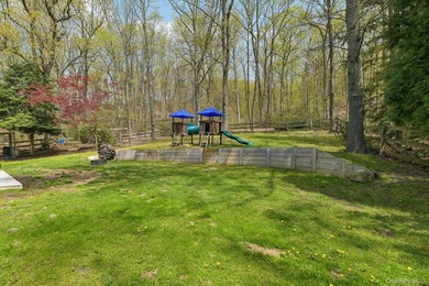 Set on a full acre and surrounded by mature trees and lush - photo 21