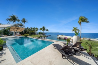 Welcome to Serenity Cay, an exquisite Balinese-inspired estate