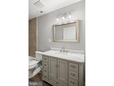 This beautifully renovated one level townhouse offers affordable - photo 17