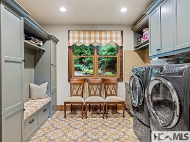 Experience lakeside luxury in this magnificently updated - photo 18