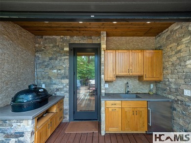 Experience lakeside luxury in this magnificently updated - photo 21