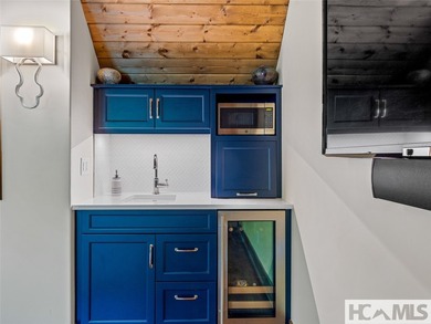 Experience lakeside luxury in this magnificently updated - photo 33