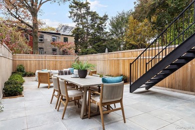 Located on a tree-lined townhouse block in the heart of Boerum - photo 6