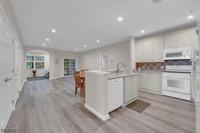 Enjoy effortless living in this desirable active adult community