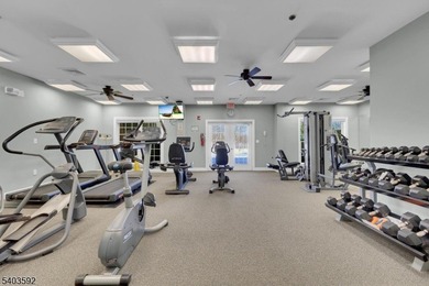 Enjoy effortless living in this desirable active adult community