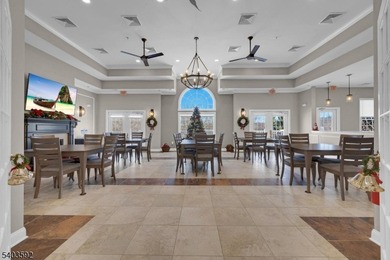 Enjoy effortless living in this desirable active adult community