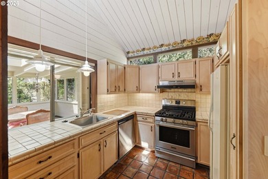 Custom townhouse tucked away on 3+ private, in-town acres - photo 10