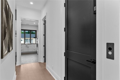 Welcome to an extraordinary lakefront retreat in the prestigious - photo 14