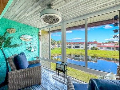 BEAUTIFULLY UPDATED LAKEVIEW CONDO WITH IMPACT GLASS PATIO/LANAI - photo 2