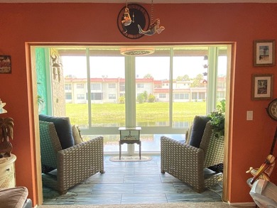 BEAUTIFULLY UPDATED LAKEVIEW CONDO WITH IMPACT GLASS PATIO/LANAI - photo 8