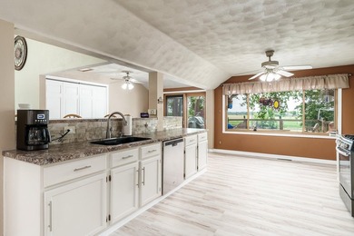This exceptional 2,007 square foot ranch offers riverfront - photo 34