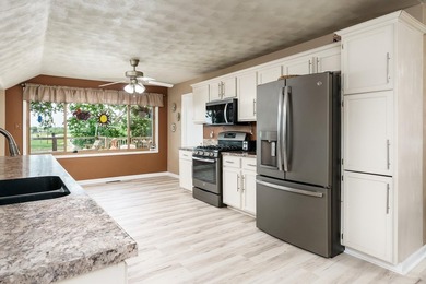 This exceptional 2,007 square foot ranch offers riverfront - photo 35