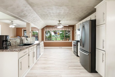 This exceptional 2,007 square foot ranch offers riverfront - photo 36