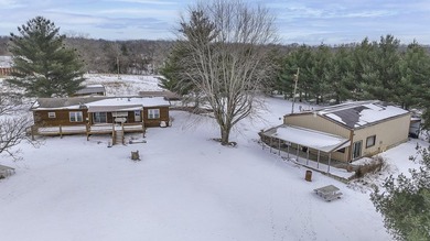Hidden among mature trees and open acreage, this maintained