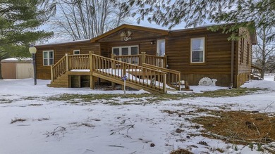 Hidden among mature trees and open acreage, this maintained