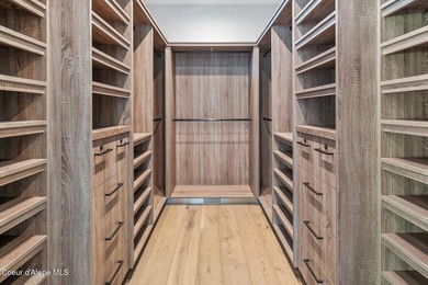 Set against a serene stand of forest, this spacious residence - photo 11
