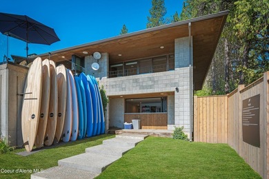 Set against a serene stand of forest, this spacious residence - photo 31